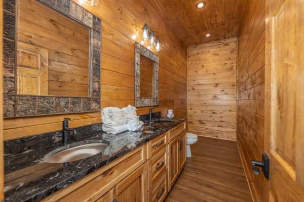  Bathroom with double vanity sink at Black Bears & Biscuits Lodge, a 6 bedroom cabin rental located in Pigeon Forge