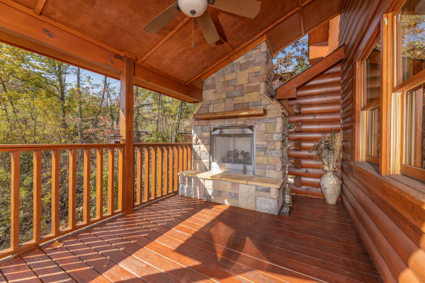 Fireplace on the deck at Sensational Views, a 3 bedroom cabin rental located in Gatlinburg