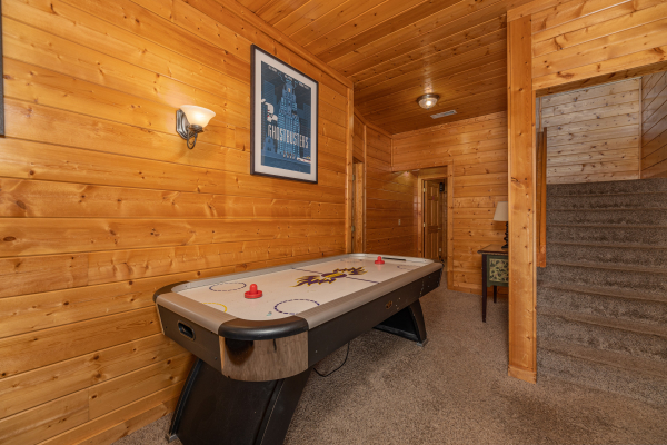 Air hockey table at Grizzly's Den, a 5 bedroom cabin rental located in Gatlinburg