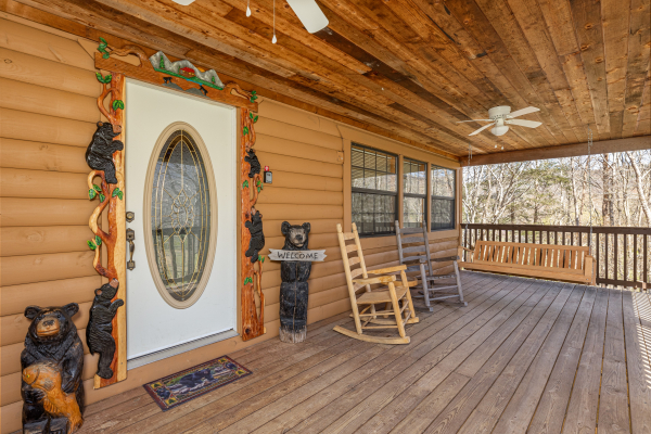 Front door and porch at A Mountain Hyde-a Way, a 2 bedroom cabin rental located in Pigeon Forge