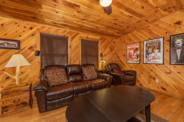 Seating in the lower living room at Hatcher Mountain Retreat a 2 bedroom cabin rental located in Pigeon Forge