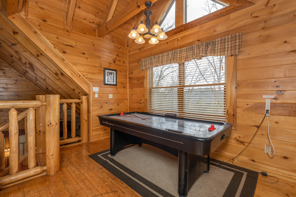 Air hockey table at Absolutely Wonderful, a 2 bedroom cabin rental located in Pigeon Forge