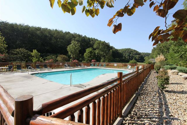 Outdoor pool for guests at Absolutely Wonderful, a 2 bedroom cabin rental located in Pigeon Forge