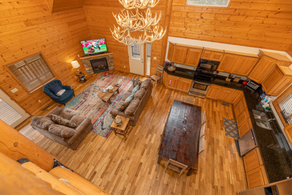Looking down at the main floor at Smoky Mountain Escape, a 3 bedroom cabin rental located in Pigeon Forge
