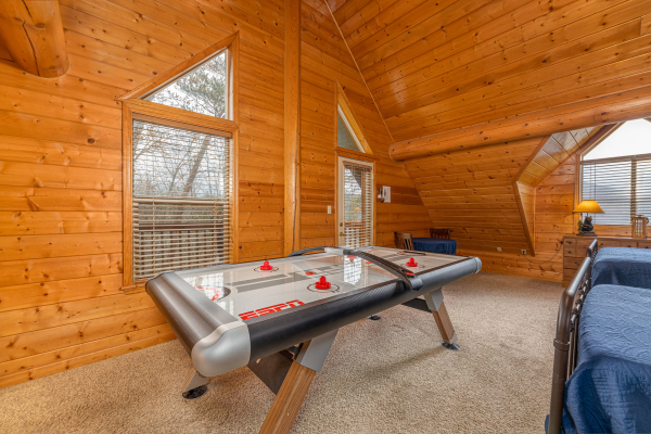 Air hockey table at Smoky Mountain Escape, a 3 bedroom cabin rental located in Pigeon Forge