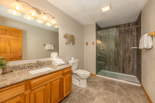 Bathroom with a walk in shower at Smoky Mountain Escape, a 3 bedroom cabin rental located in Pigeon Forge