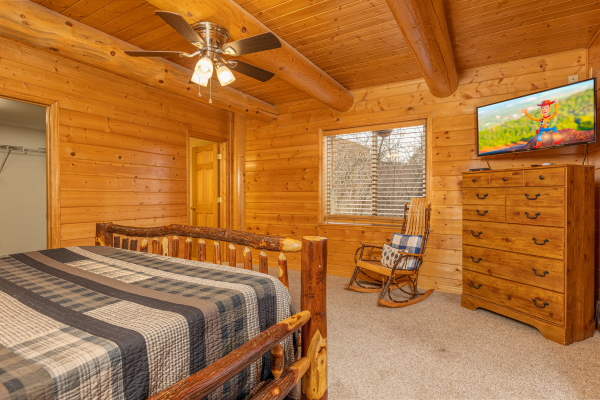 Dresser and TV in a bedroom at Smoky Mountain Escape, a 3 bedroom cabin rental located in Pigeon Forge