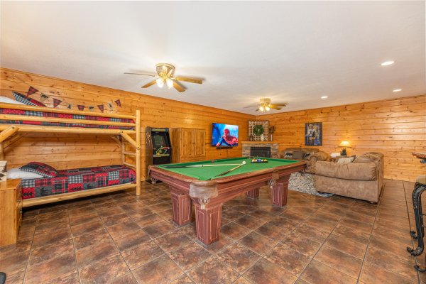 Game room with bunk beds and pool table at Smoky Mountain Escape, a 3 bedroom cabin rental located in Pigeon Forge