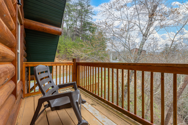 Rocking chair on the upper deck at Smoky Mountain Escape, a 3 bedroom cabin rental located in Pigeon Forge