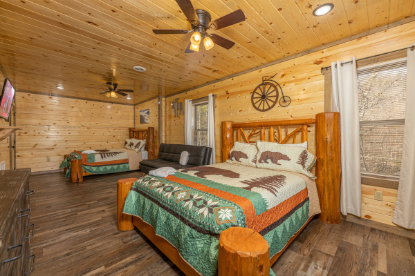 Bedroom with two queen beds at Everly's Splash, a 4 bedroom cabin rental located in Pigeon Forge