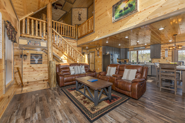 Leather sofa and loveseat in the living room at Everly's Splash, a 4 bedroom cabin rental located in Pigeon Forge