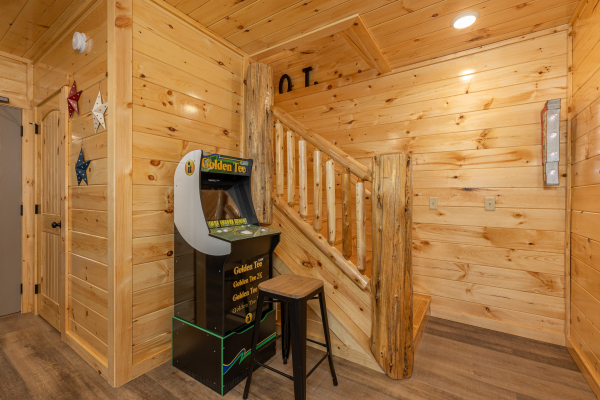 Arcade game at Poolin Around, a 2 bedroom cabin rental located in Gatlinburg