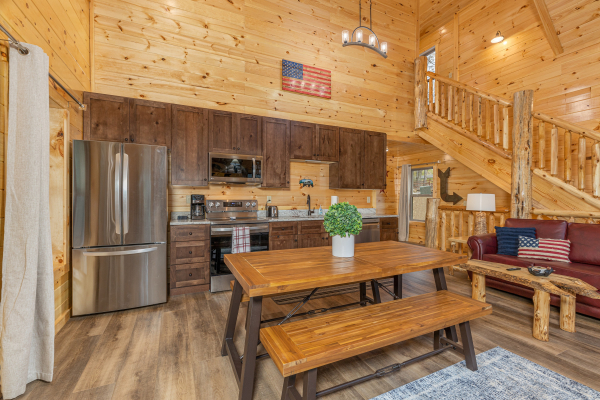 Dining table at Poolin Around, a 2 bedroom cabin rental located in Gatlinburg