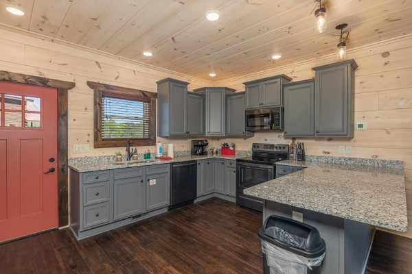 Kitchen and entryway at Smoky Mountain Chalet, a 3 bedroom cabin rental located in Pigeon Forge