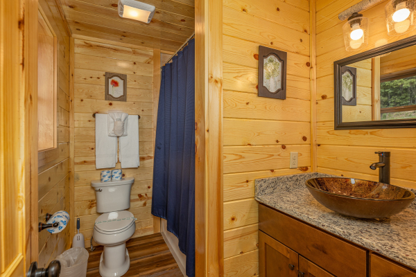 Bathroom with a tub and shower at 4 States View, a 2 bedroom cabin rental located in Pigeon Forge