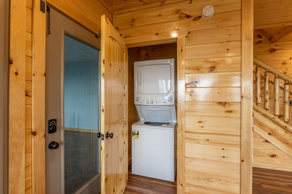 Stacked washer and dryer at 4 States View, a 2 bedroom cabin rental located in Pigeon Forge