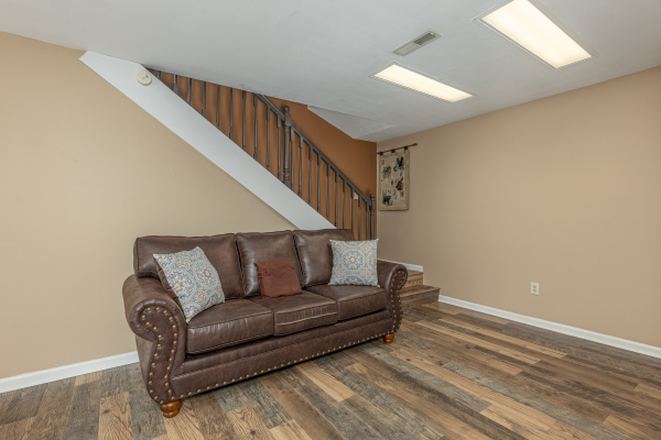Lower level seating at High In The Smokies, a 2 bedroom cabin rental located in Gatlinburg