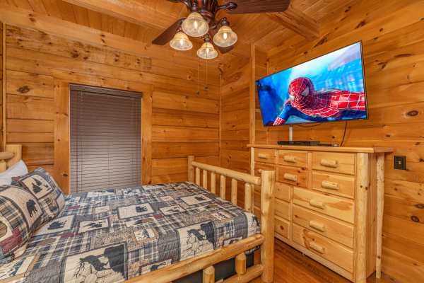 Main floor bedroom TV at Smokies Serenity, a 2 bedroom cabin rental located in Douglas Lake