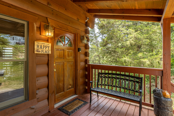 Front porch loveseat at Smokies Serenity, a 2 bedroom cabin rental located in Douglas Lake