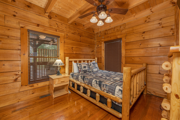 Main floor bedroom with queen bed at Smokies Serenity, a 2 bedroom cabin rental located in Douglas Lake