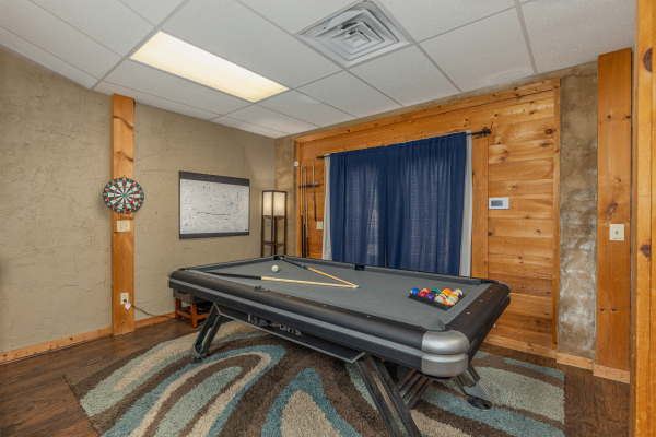 Pool table on lower level at Smokies Serenity, a 2 bedroom cabin rental located in Douglas Lake