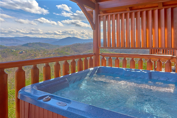 Hot tub on upper deck at Million Dollar View, a 2 bedroom cabin rental located in Pigeon Forge
