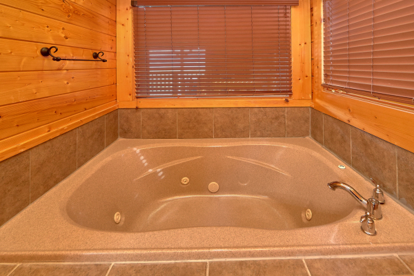 Jacuzzi tub on upper floor bathroom at Million Dollar View, a 2 bedroom cabin rental located in Pigeon Forge