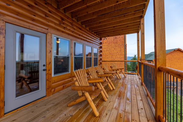 Deck seating at The One With The View, a 4 bedroom cabin rental located in Pigeon Forge