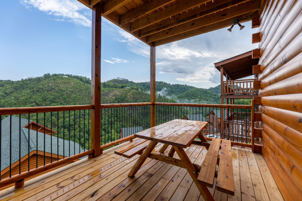 Picnic table at The One With The View, a 4 bedroom cabin rental located in Pigeon Forge