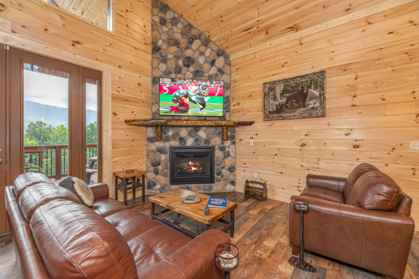 Living room seating at Twin Peaks, a 5 bedroom cabin rental located in Gatlinburg