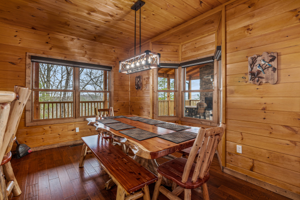 Dining table for 8 at Four Seasons Grand, a 5 bedroom cabin rental located in Pigeon Forge