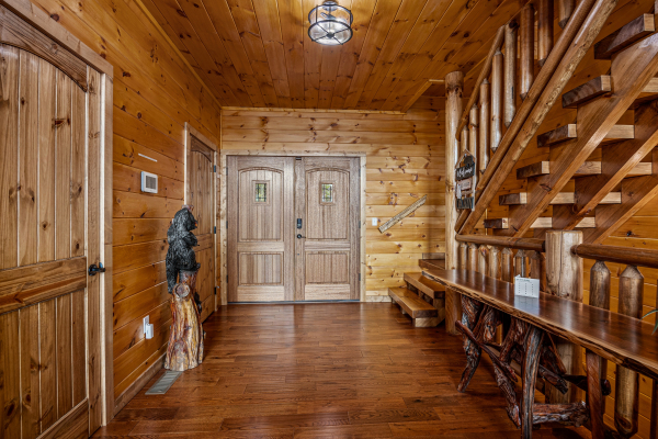 Entry and staircase at Four Seasons Grand, a 5 bedroom cabin rental located in Pigeon Forge