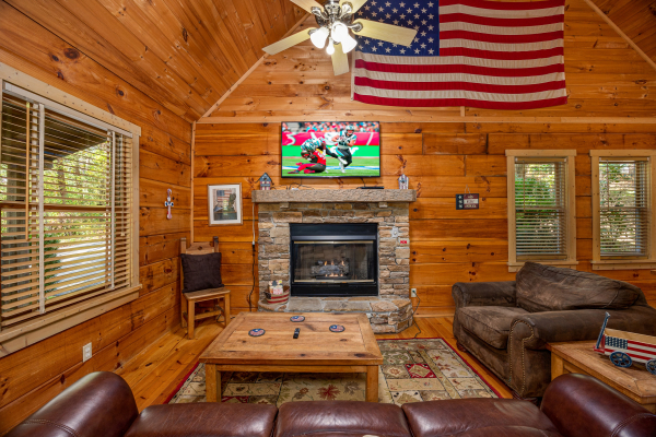 Living room seating at old glory, a 2 bedroom cabin rental located in Pigeon Forge