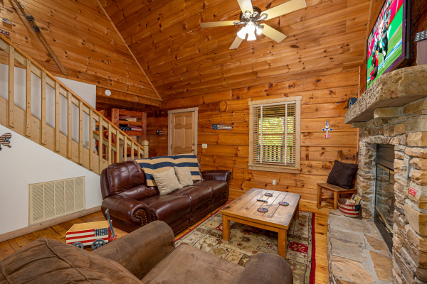 Staircase view from Livingroom at old glory, a 2 bedroom cabin rental located in Pigeon Forge