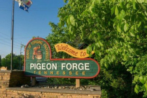 Pigeon Forge welcome sign near old glory, a 2 bedroom cabin rental located in Pigeon Forge