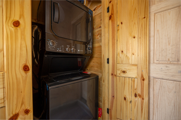 Washer and dryer at Mountain Pool & Paradise, a 3 bedroom cabin rental located in Pigeon Forge
