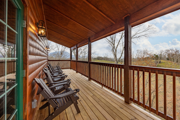 Back deck seating at Mountain Pool & Paradise, a 3 bedroom cabin rental located in Pigeon Forge