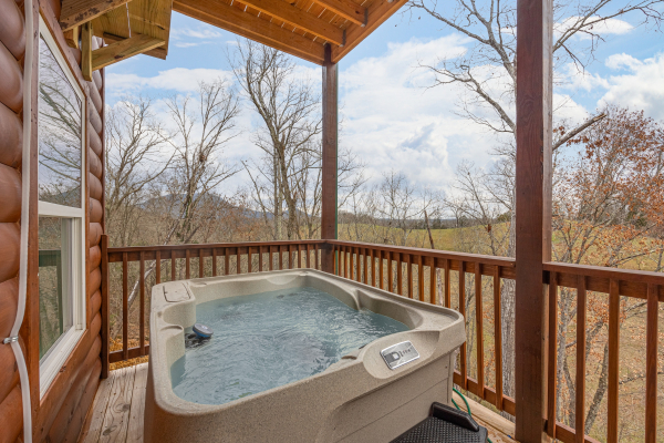 Hot Tub at Mountain Pool & Paradise, a 3 bedroom cabin rental located in Pigeon Forge