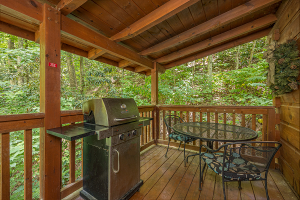 Gas Grill and Deck Seating on Covered Deck at Wild At Heart Wears Valley