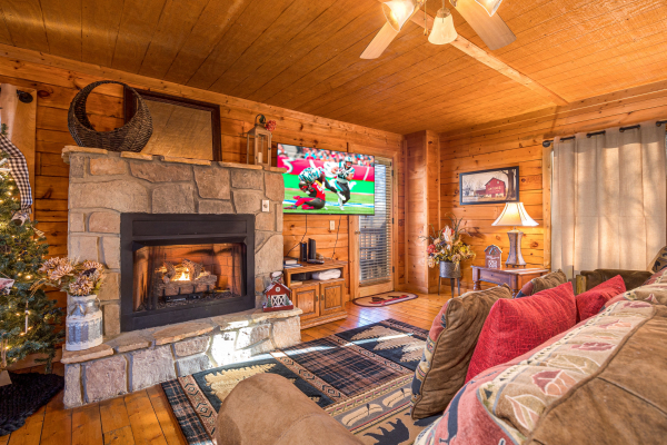 Stone fireplace at Sunny Side Up, a 2 bedroom cabin rental located in Gatlinburg
