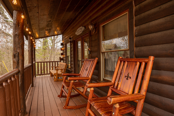 Deck rocking chairs at Moonlight in the Boondocks, a 2 bedroom cabin rental located in Gatlinburg