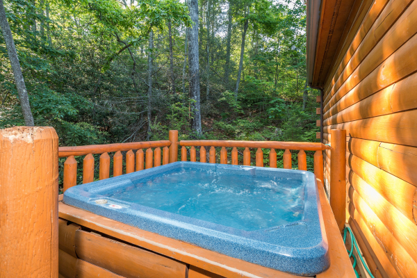 Hot tub on the deck at Bearstone Cabin, a 1 bedroom cabin rental located in Gatlinburg