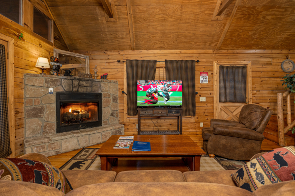 Livingroom fireplace at Lincoln Logs, a 2 bedroom cabin rental located in Gatlinburg 