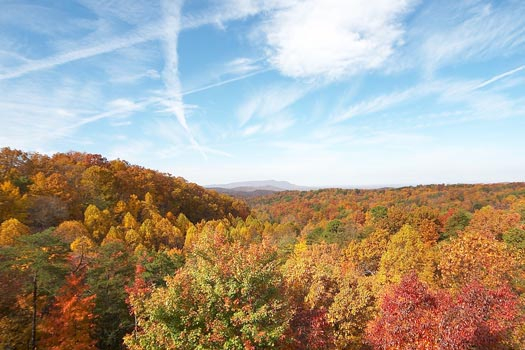Fall foliage of the Smoky Mountains seen from Big Bear Lodge, a 7-bedroom cabin rental located in Gatlinburg