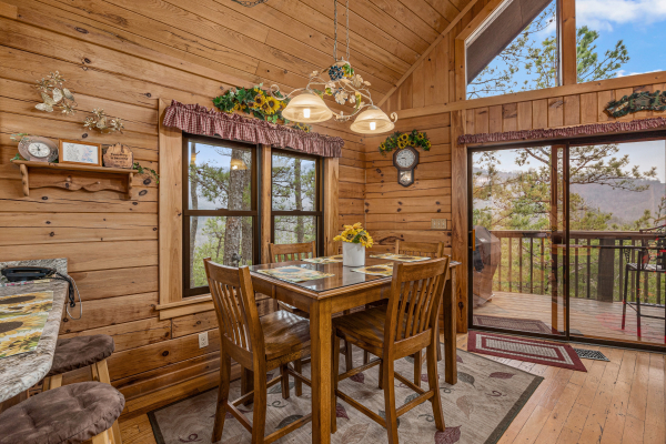 Dining table for 4 at R & R Hideaway, a 1 bedroom cabin rental located in Pigeon Forge
