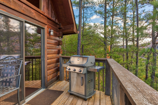 Grill on the deck at R & R Hideaway, a 1 bedroom cabin rental located in Pigeon Forge