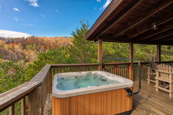 Hot tub on the deck at R & R Hideaway, a 1 bedroom cabin rental located in Pigeon Forge