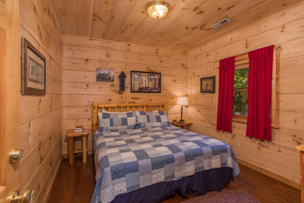 King bedroom at Patriot Pointe, a 5 bedroom cabin rental located in Pigeon Forge
