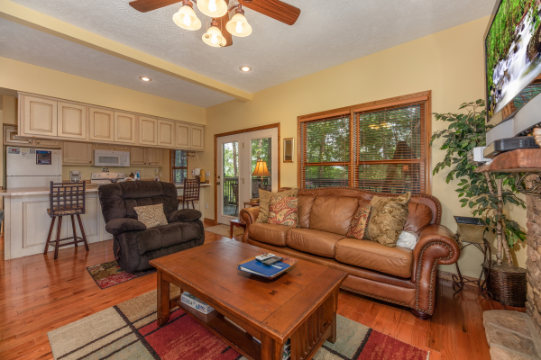 Living room seating at Amazing Memories, a 3 bedroom cabin rental located in Pigeon Forge