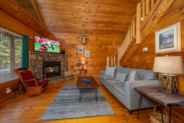 Living room amenities at American Dream, a 2 bedroom cabin rental located in Gatlinburg
